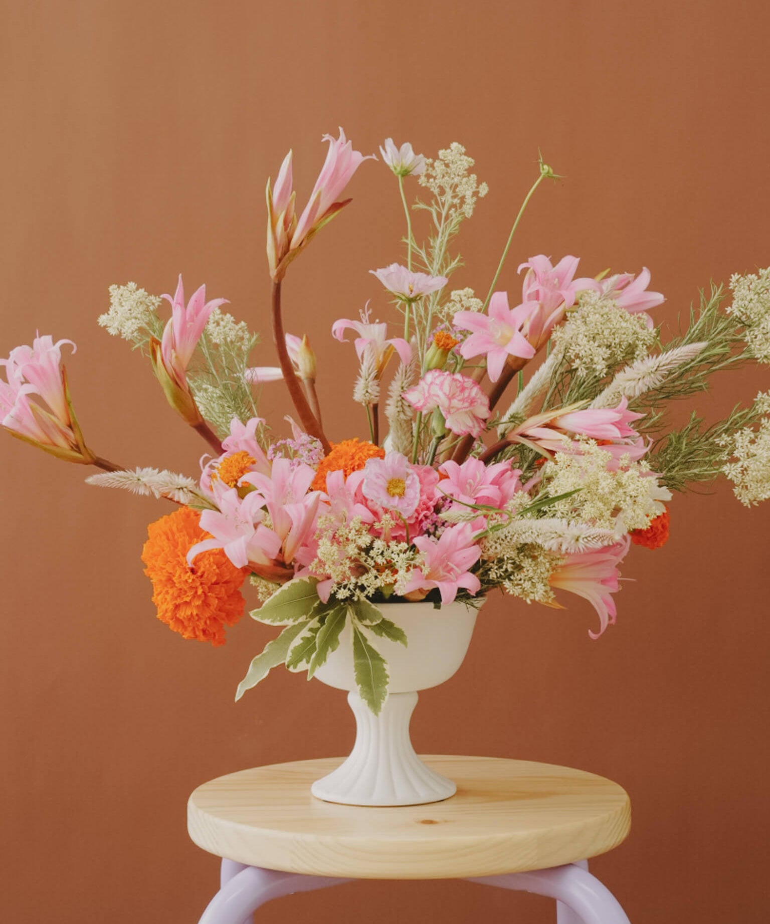 Bright Pink and Orange flowers on a brown background, by Poppy Rose in Brisbane
