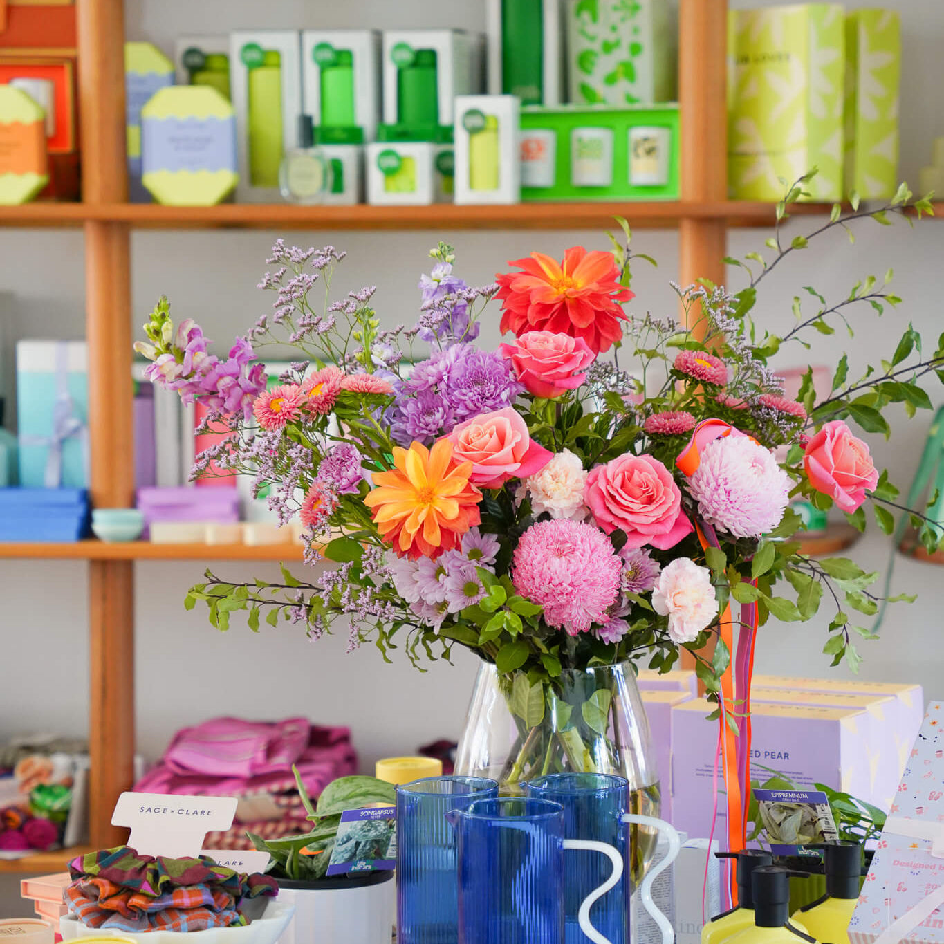 A vase of flowers in a retail store - Poppy Rose Flowers Brisbane
