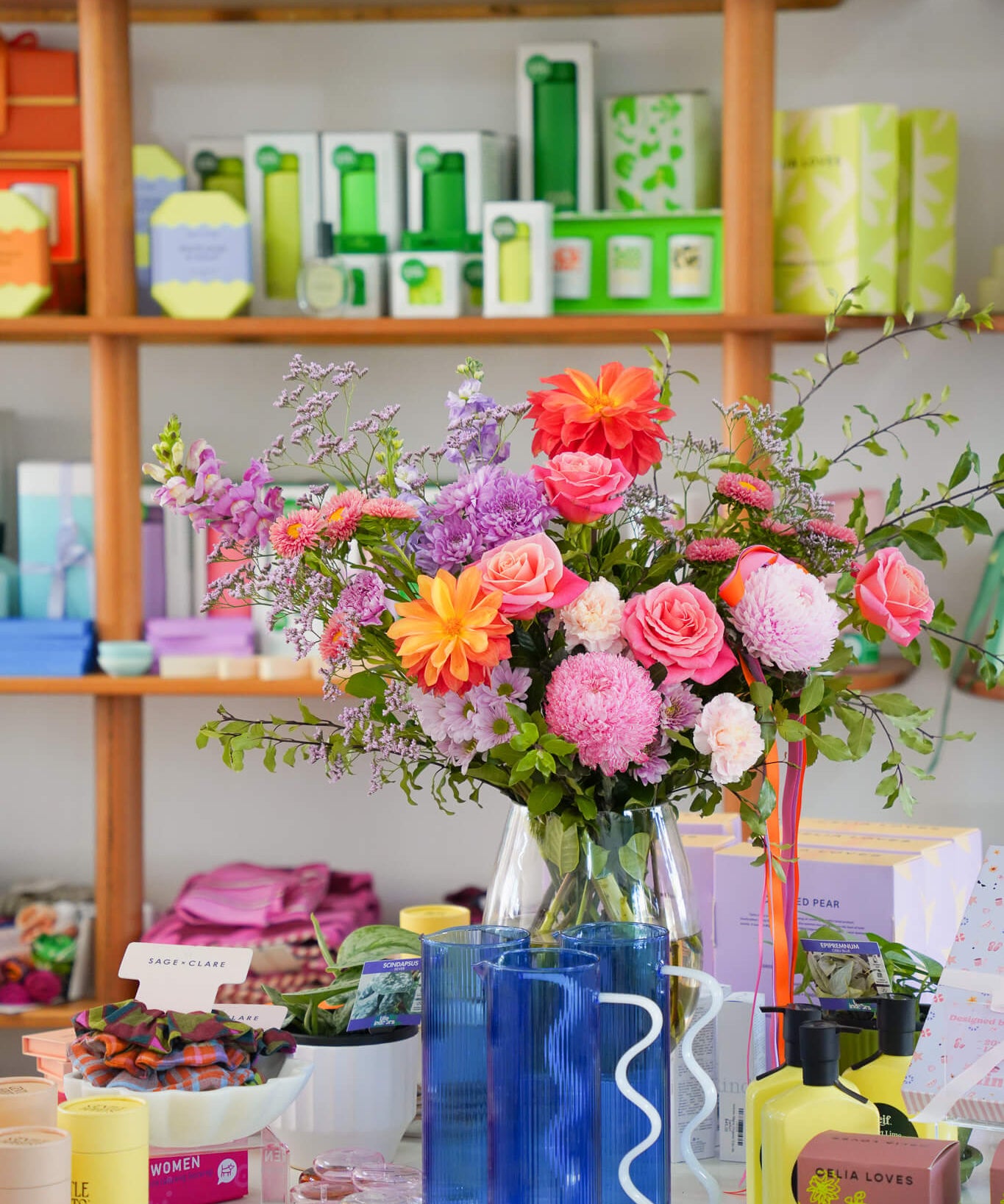 A vase of flowers in a retail store - Poppy Rose Flowers Brisbane