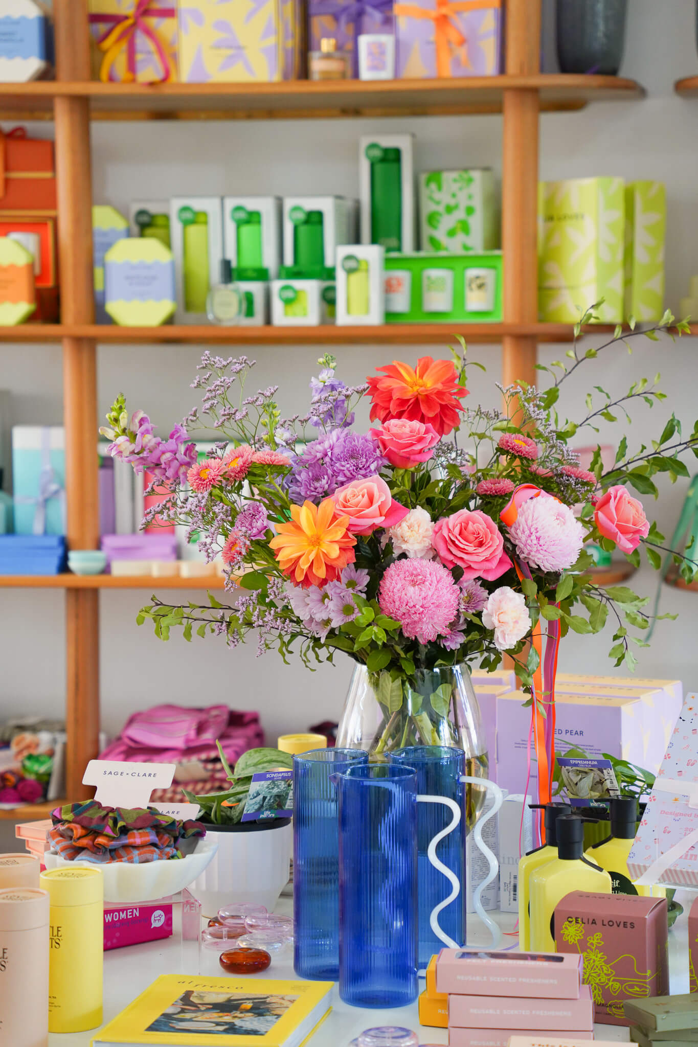 A vase of flowers in a retail store - Poppy Rose Flowers Brisbane