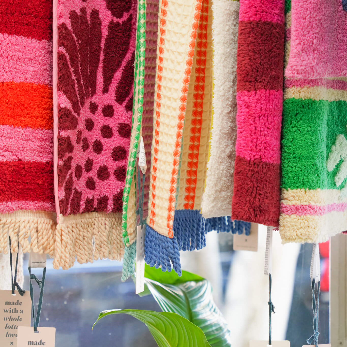 Bath Mats hanging in the window of Poppy Rose Florist in Brisbane