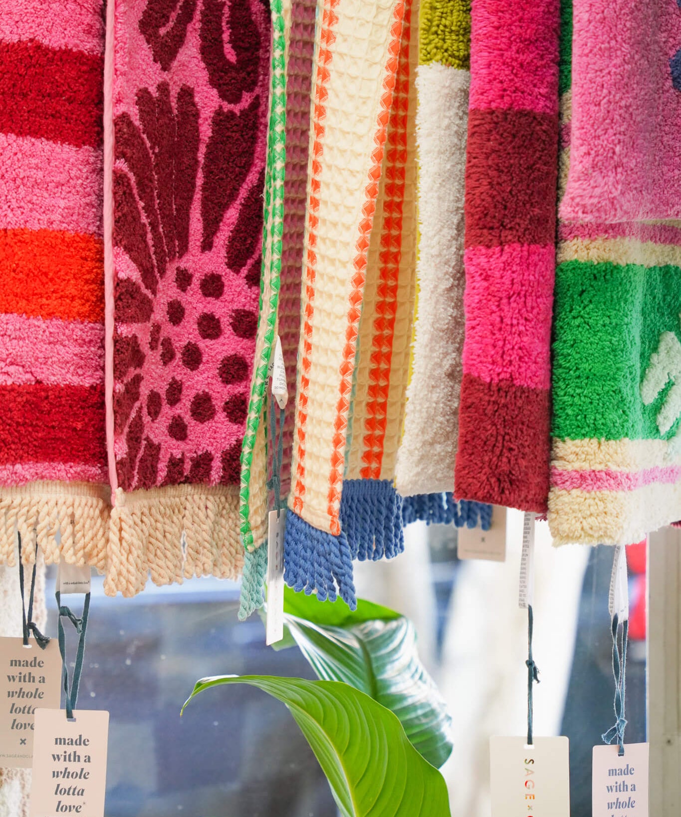 Bath Mats hanging in the window of Poppy Rose Florist in Brisbane