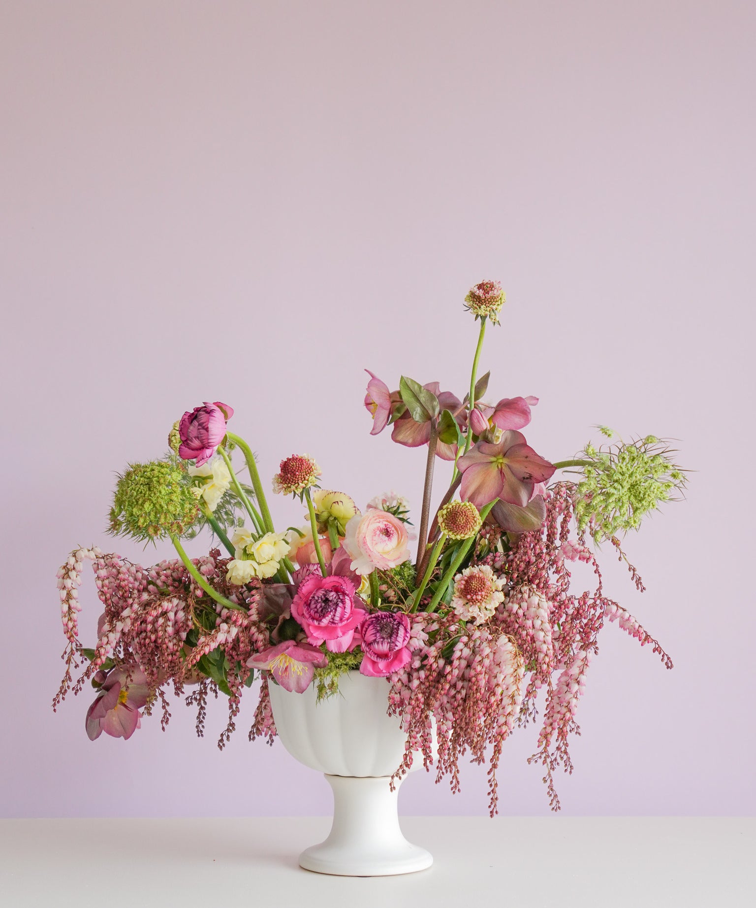 Deep moody florals made into a compote for an event by Poppy Rose Flowers in Brisbane